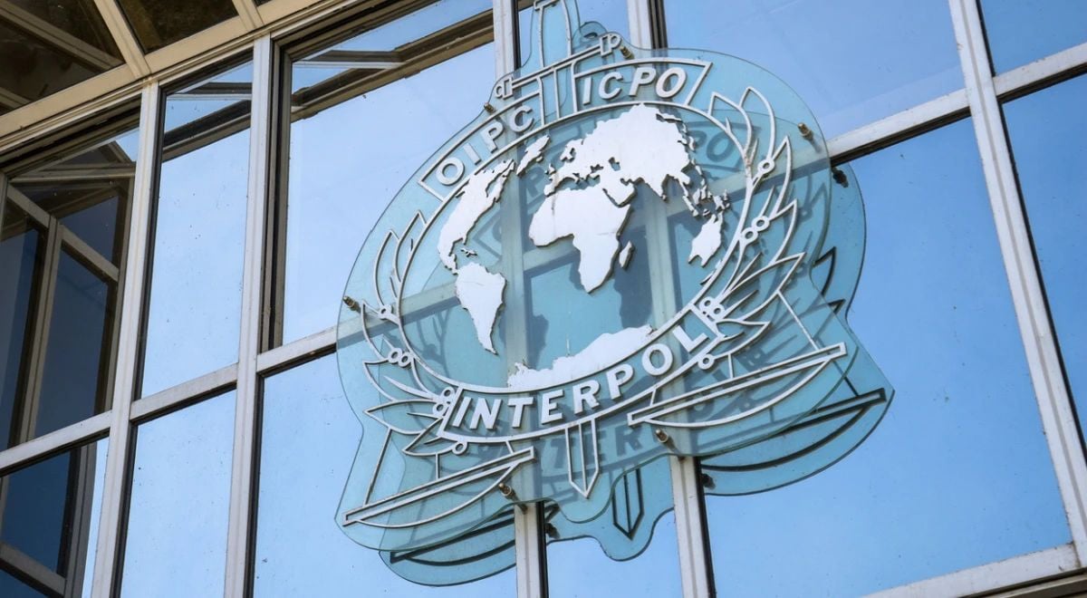 The Interpol sign hangs outside its offices