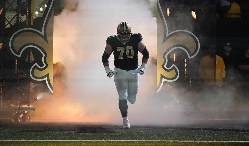 New Orleans Saints offensive tackle Trevor Penning takes the field