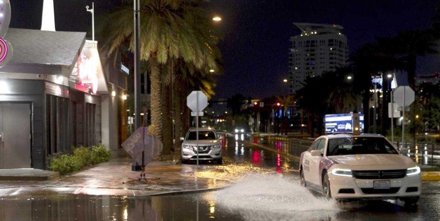 Las Vegas Casinos Hit By Torrential Rain, Drainage Channel Waters Carry Away Pedestrians